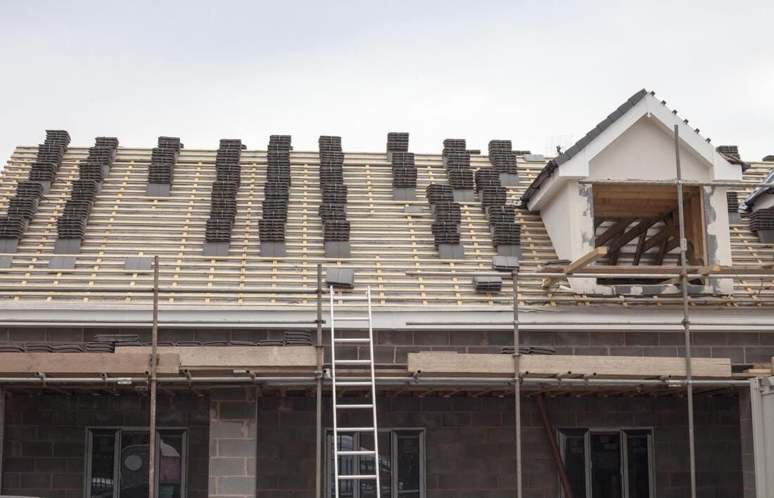 Roof tear-off work in progress